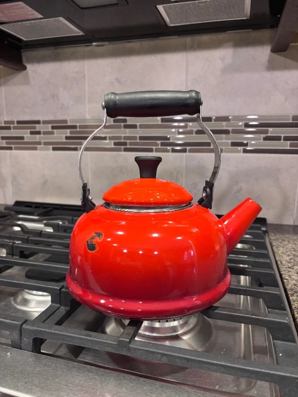 Red Le Creuset porcelain enamel 1.7 Quart tea kettle